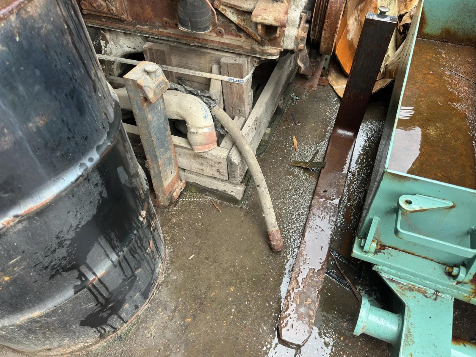 Contents Of Section: Inline 6 Diesel Motor, Tires, And 55 Gallon Barrels, photo 8 of 9