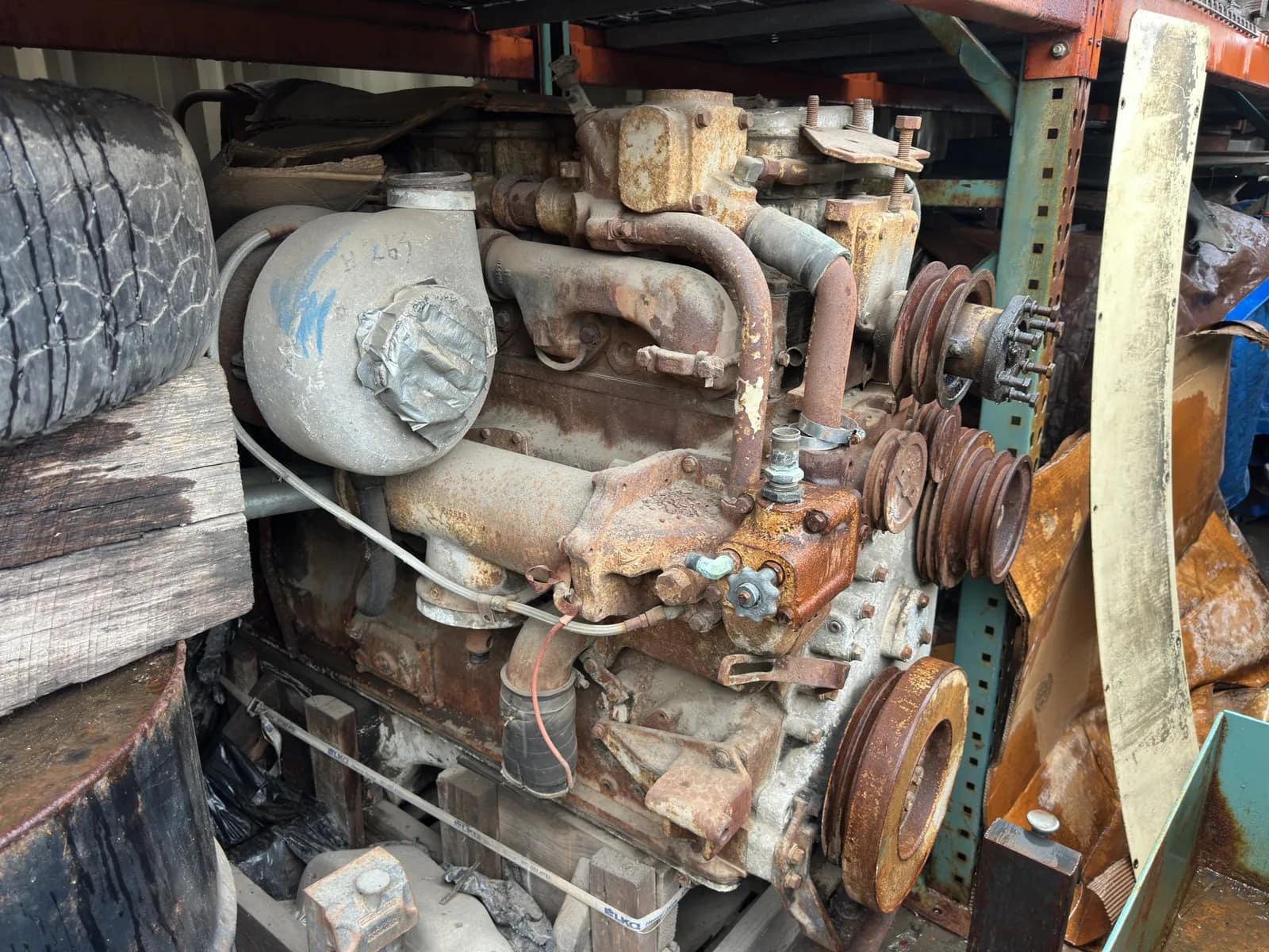 Contents Of Section: Inline 6 Diesel Motor, Tires, And 55 Gallon Barrels, photo 6 of 9
