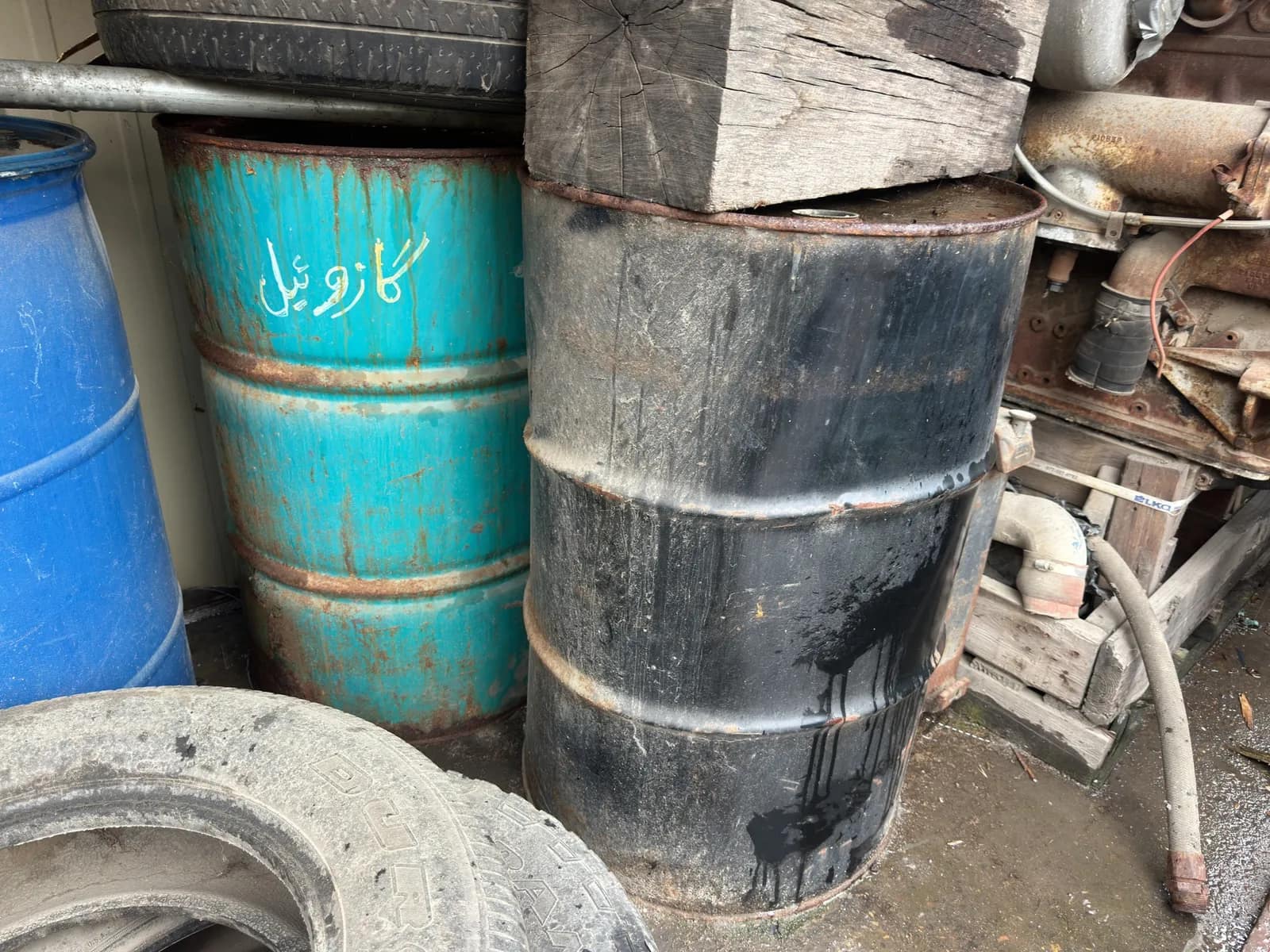 Contents Of Section: Inline 6 Diesel Motor, Tires, And 55 Gallon Barrels, photo 4 of 9