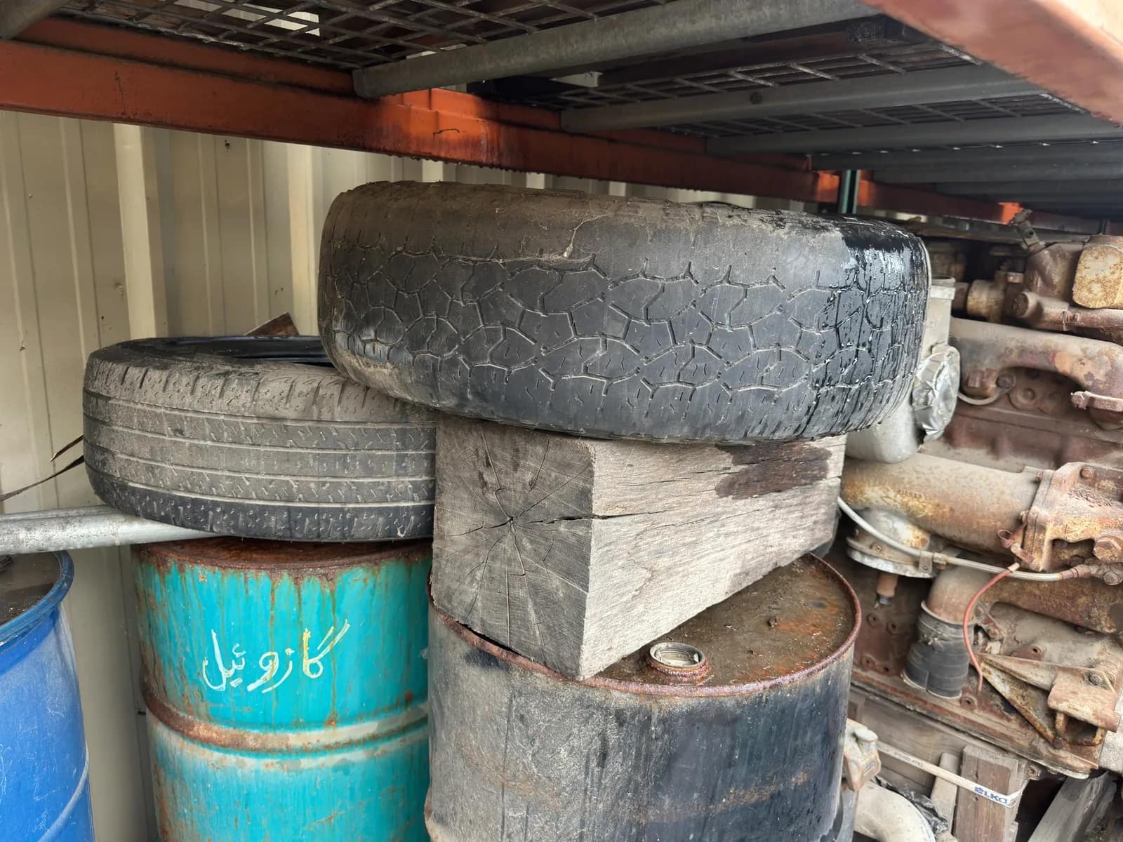 Contents Of Section: Inline 6 Diesel Motor, Tires, And 55 Gallon Barrels, photo 5 of 9