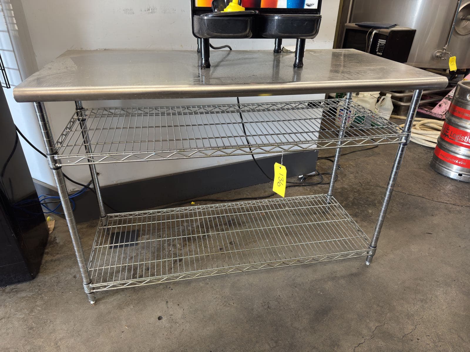 stainless-steel-adjustable-table-contents-not-included-4f1058