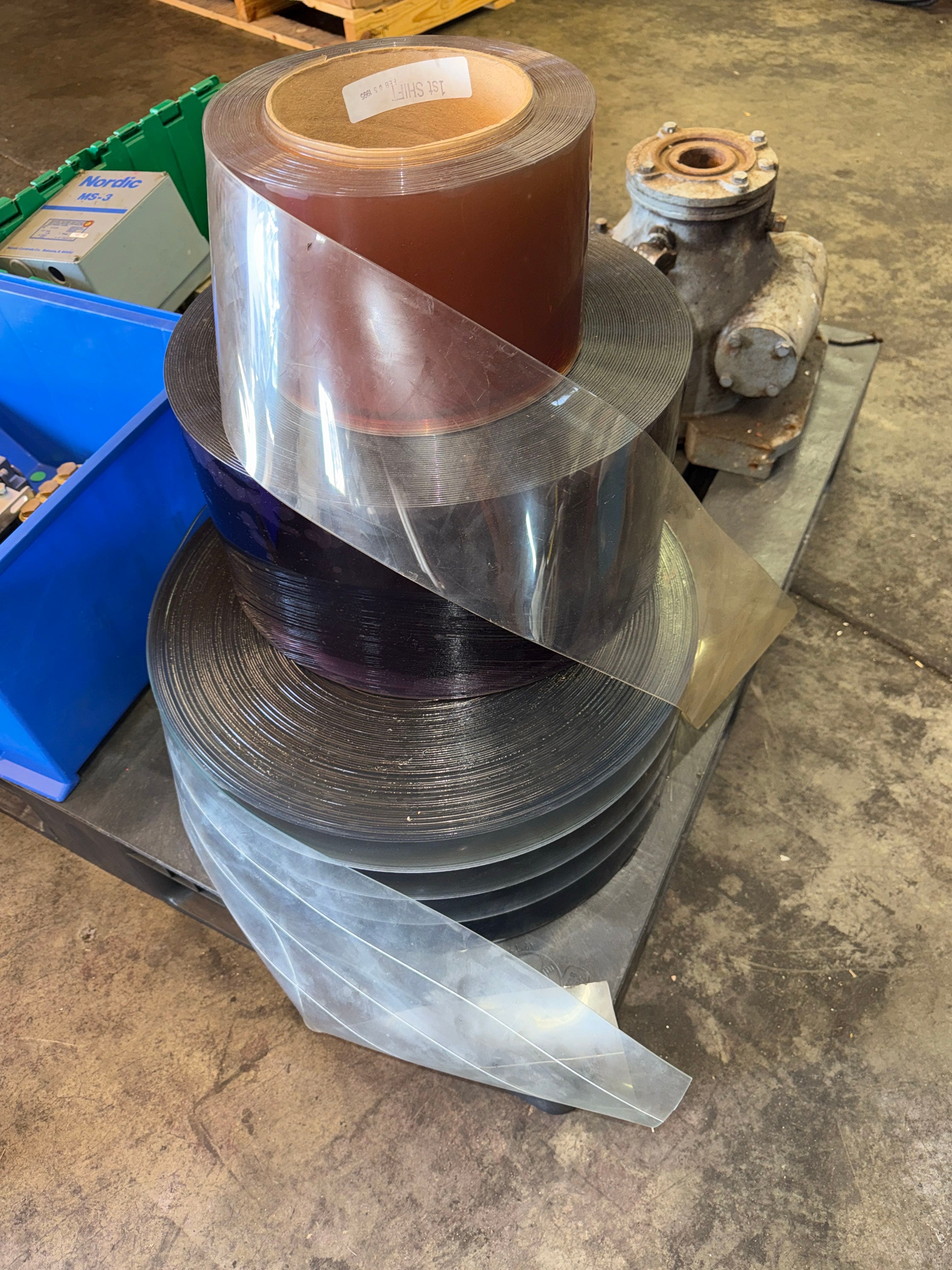 three-rolls-of-clear-plastic-shop-dividers-mlh1r5vn