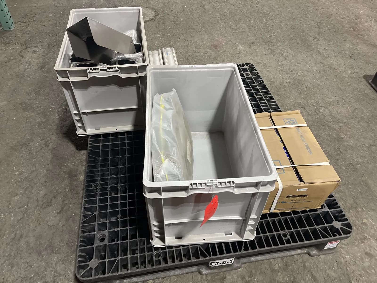 pallet-of-assorted-drive-belts-bearings-and-metal-mounting-plates-bins-not-included-mmo3pnhl