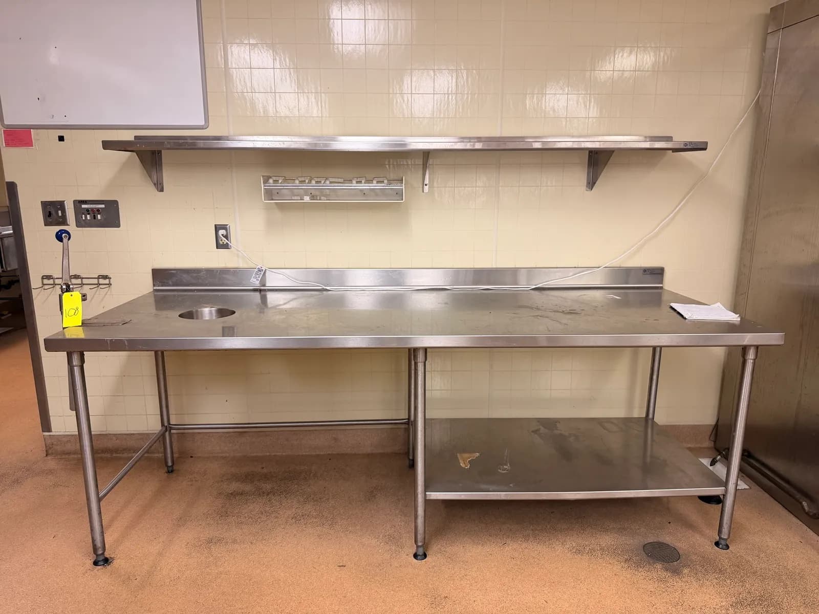 stainless-steel-table-with-industrial-can-opener-mlpjrzb6