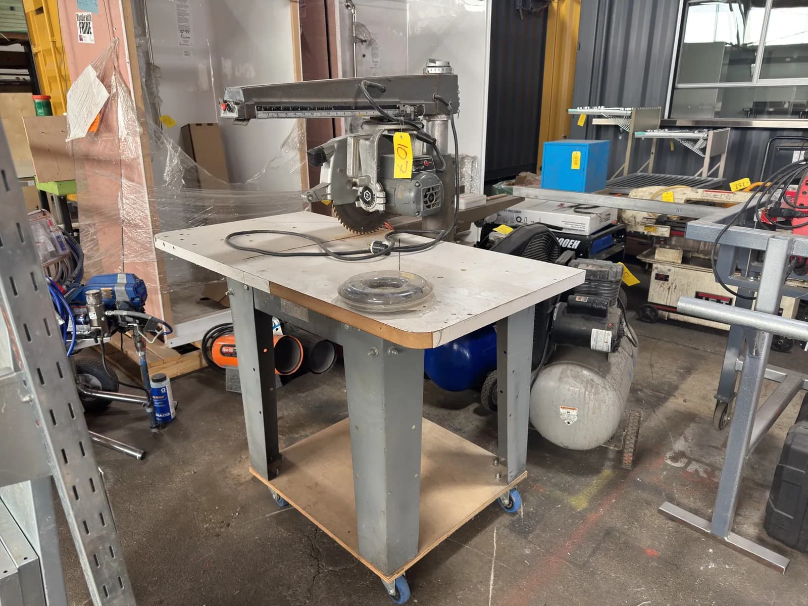 dewalt-cross-cut-saw-on-rolling-cart-c2832a