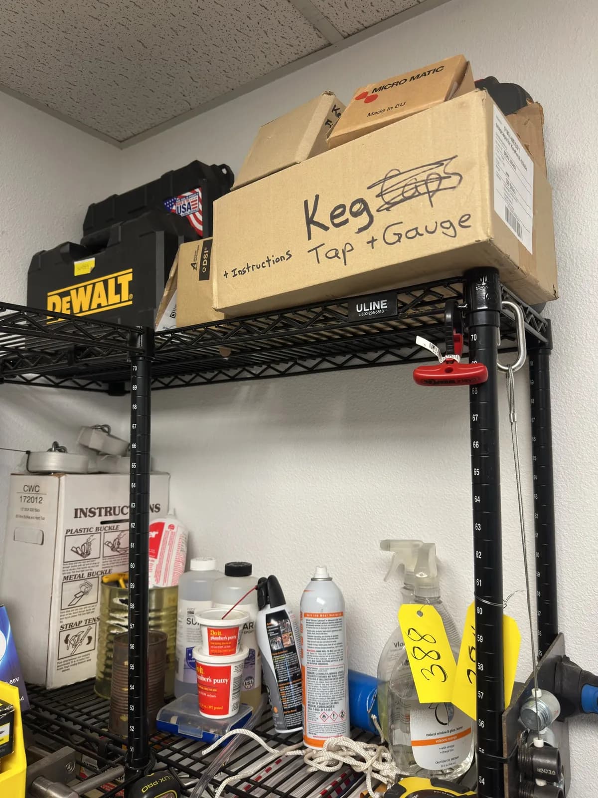 contents-of-2-shelves-computer-duster-plumbers-putty-empty-tool-cases-and-more-9c7dbb