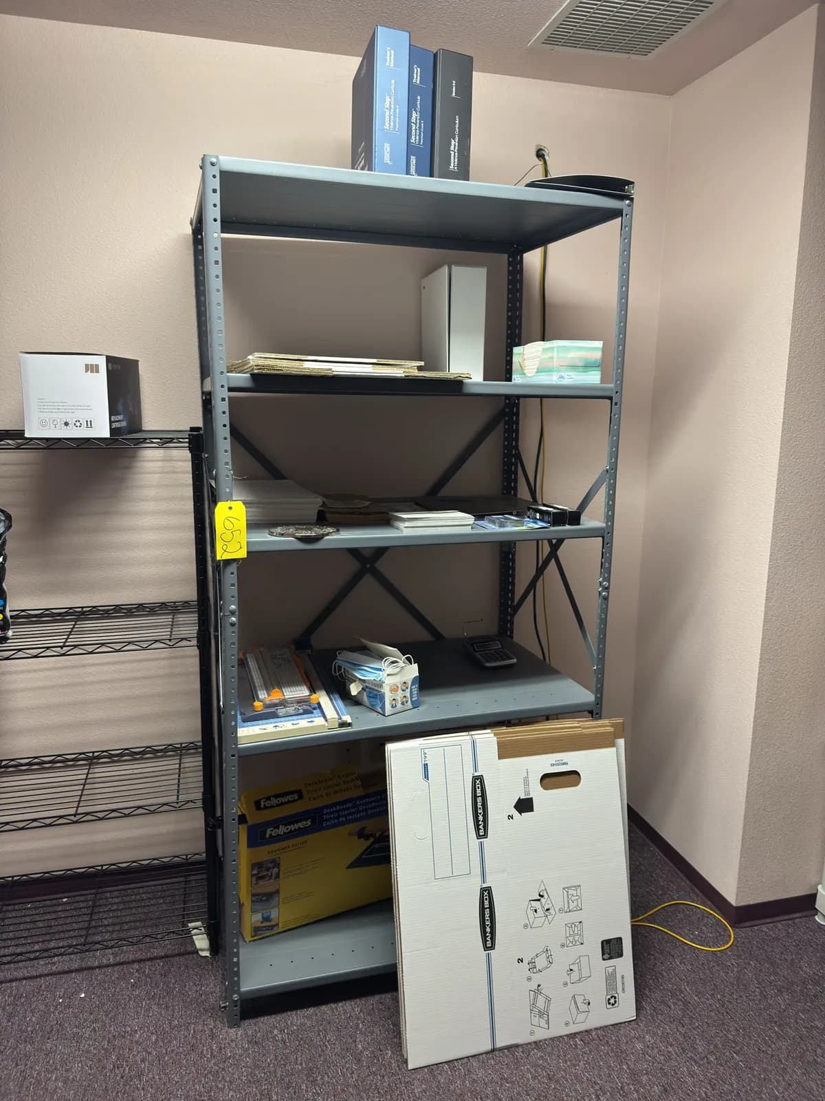 rack-and-contents-office-supplies-paper-cutter-signage-and-boxes-e446b1