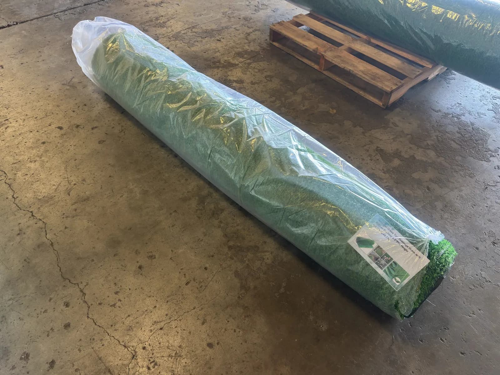 roll-of-artificial-grass-turf-with-drainage-holes-and-rubber-backing-66x492-unused-mm2tebg6