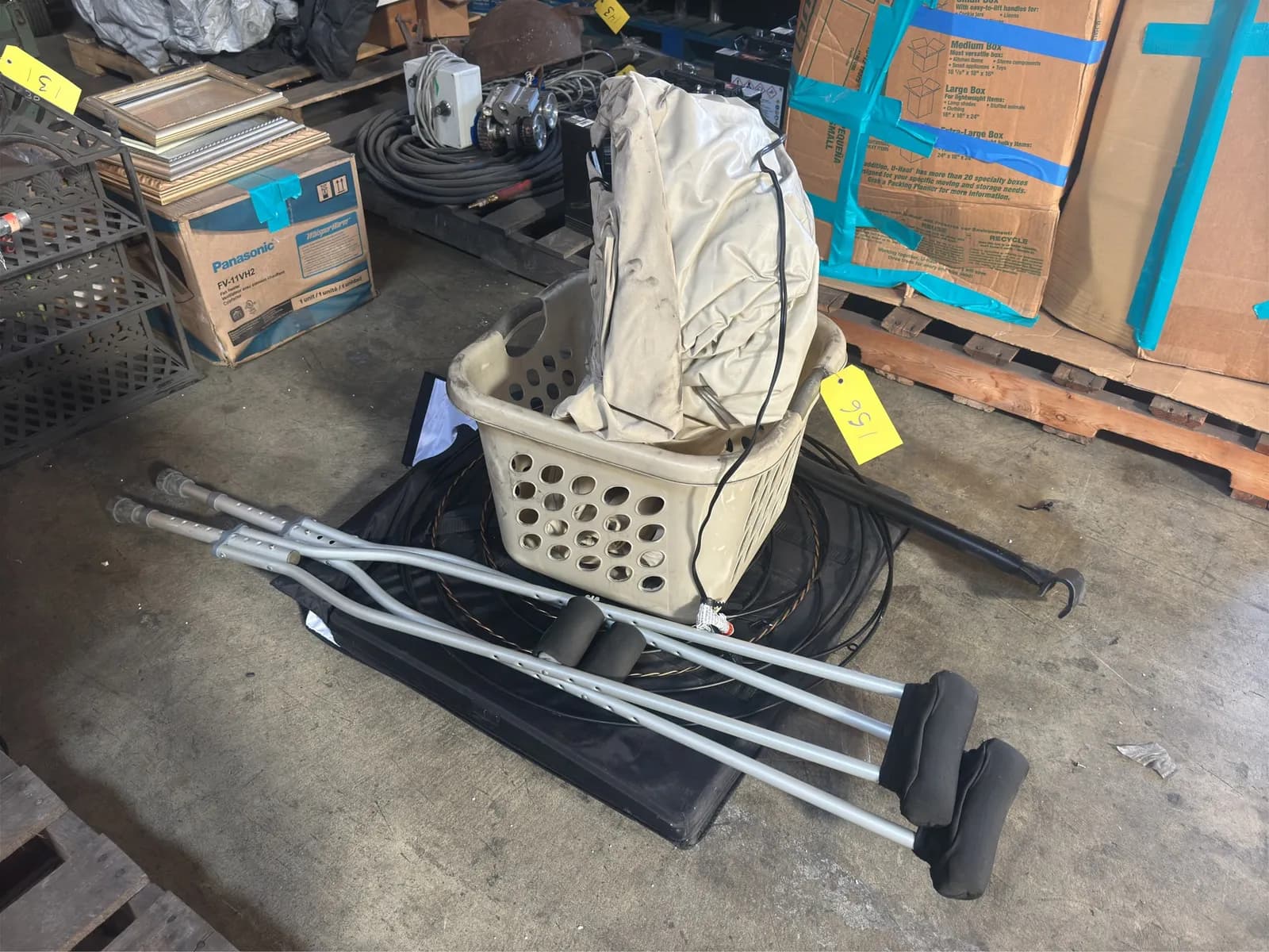 set-of-crutches-inflatable-mattress-laundry-basket-and-more-mm2pw2uc
