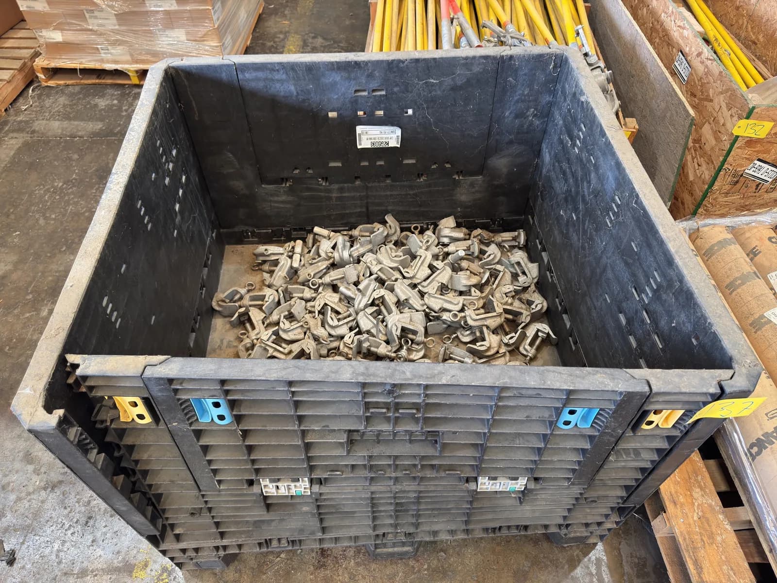 collapsing-plastic-bin-with-contents-clamp-ground-conductors-656091