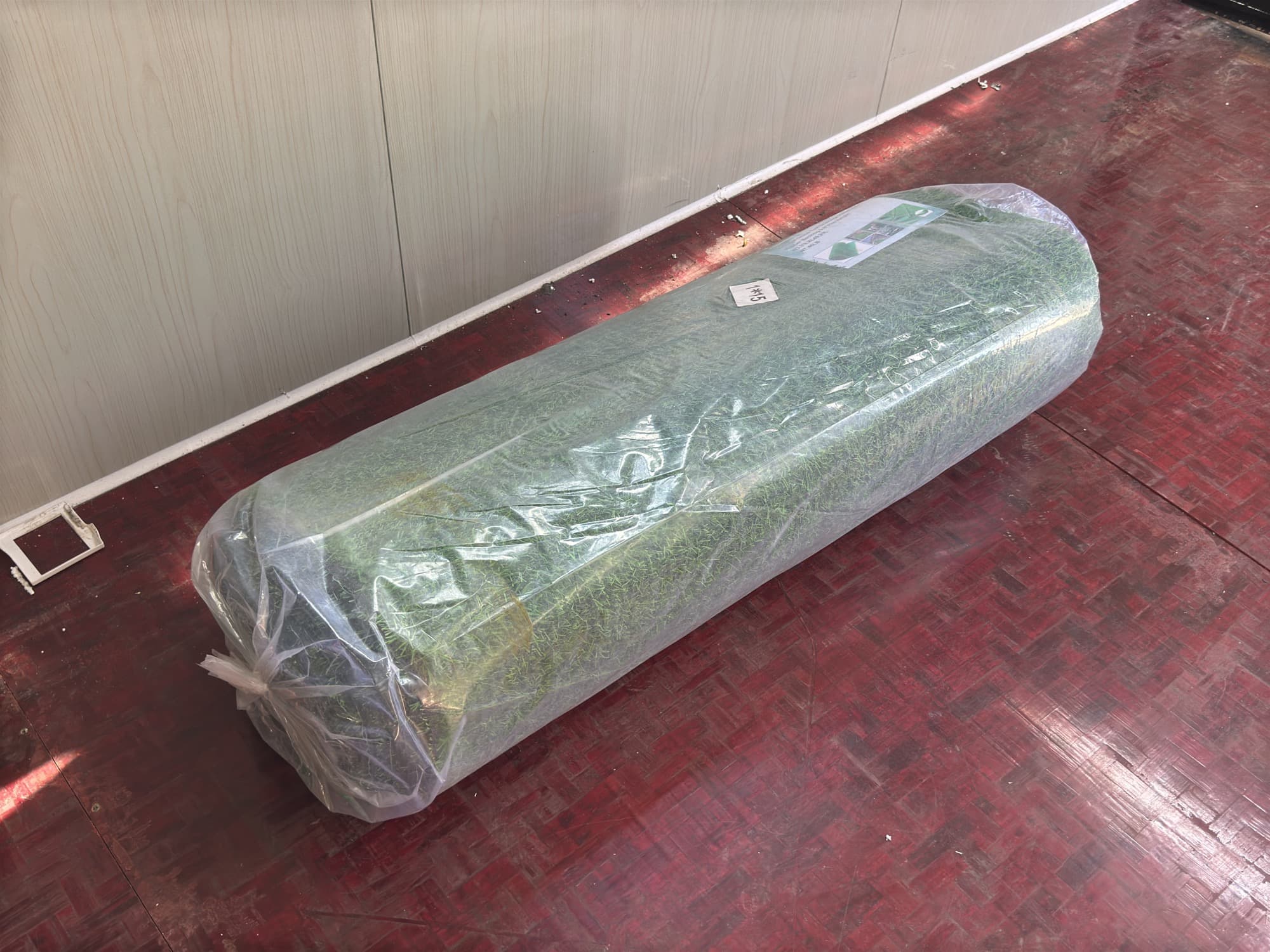 roll-of-artificial-grass-turf-with-drainage-holes-and-rubber-backing-33x492-unused-mm2tlzh8