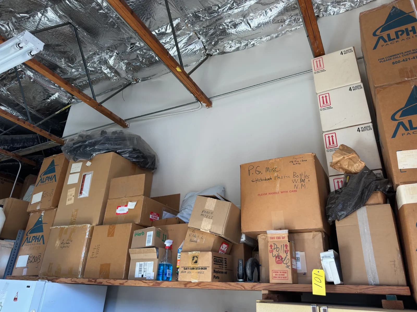 contents-of-shelf-boxes-of-multipurpose-bottles-dolly-wheels-ant-baits-and-more-0cb55b