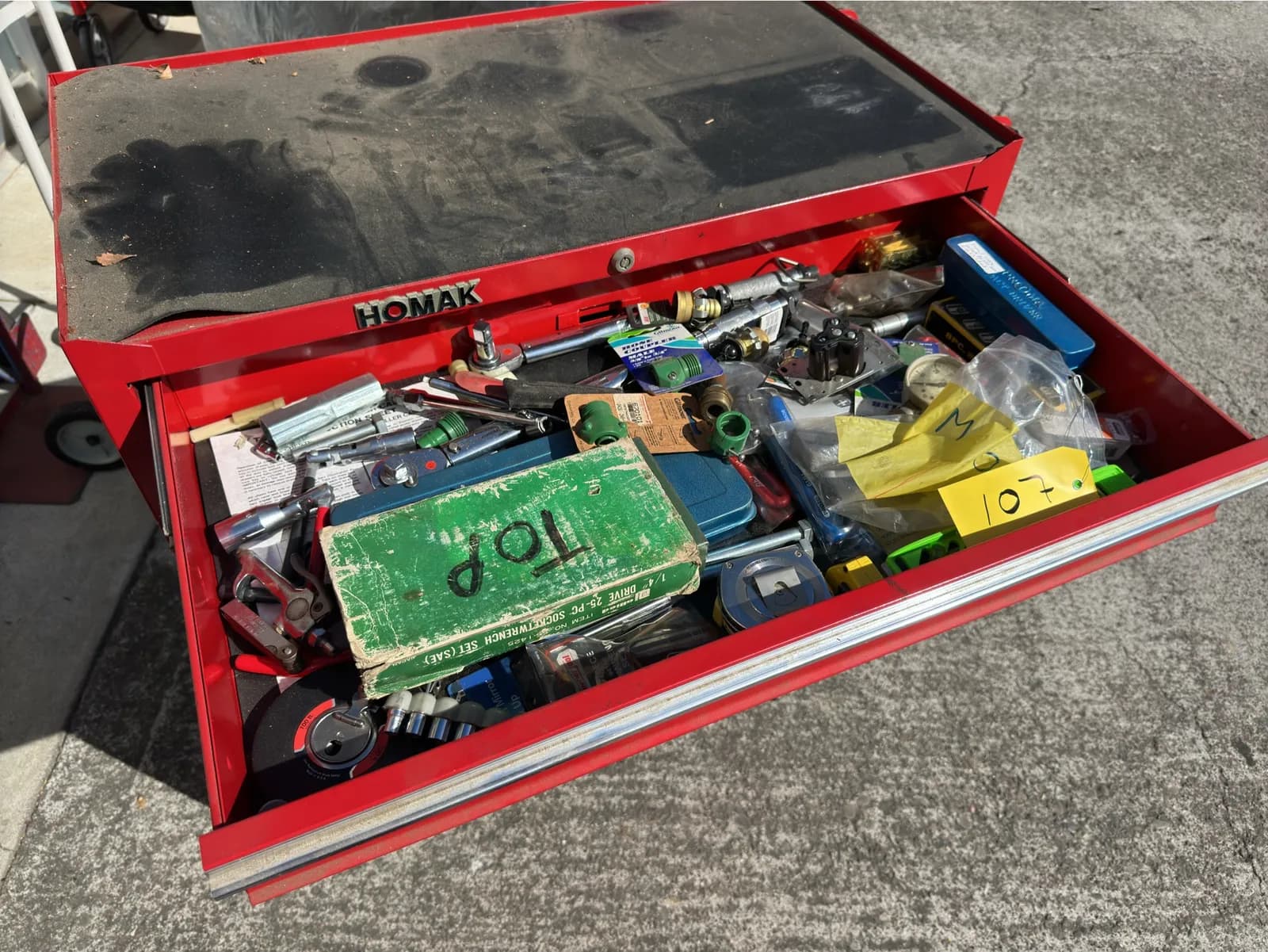 contents-of-drawer-assorted-sockets-couplers-tape-measures-and-more-c93472