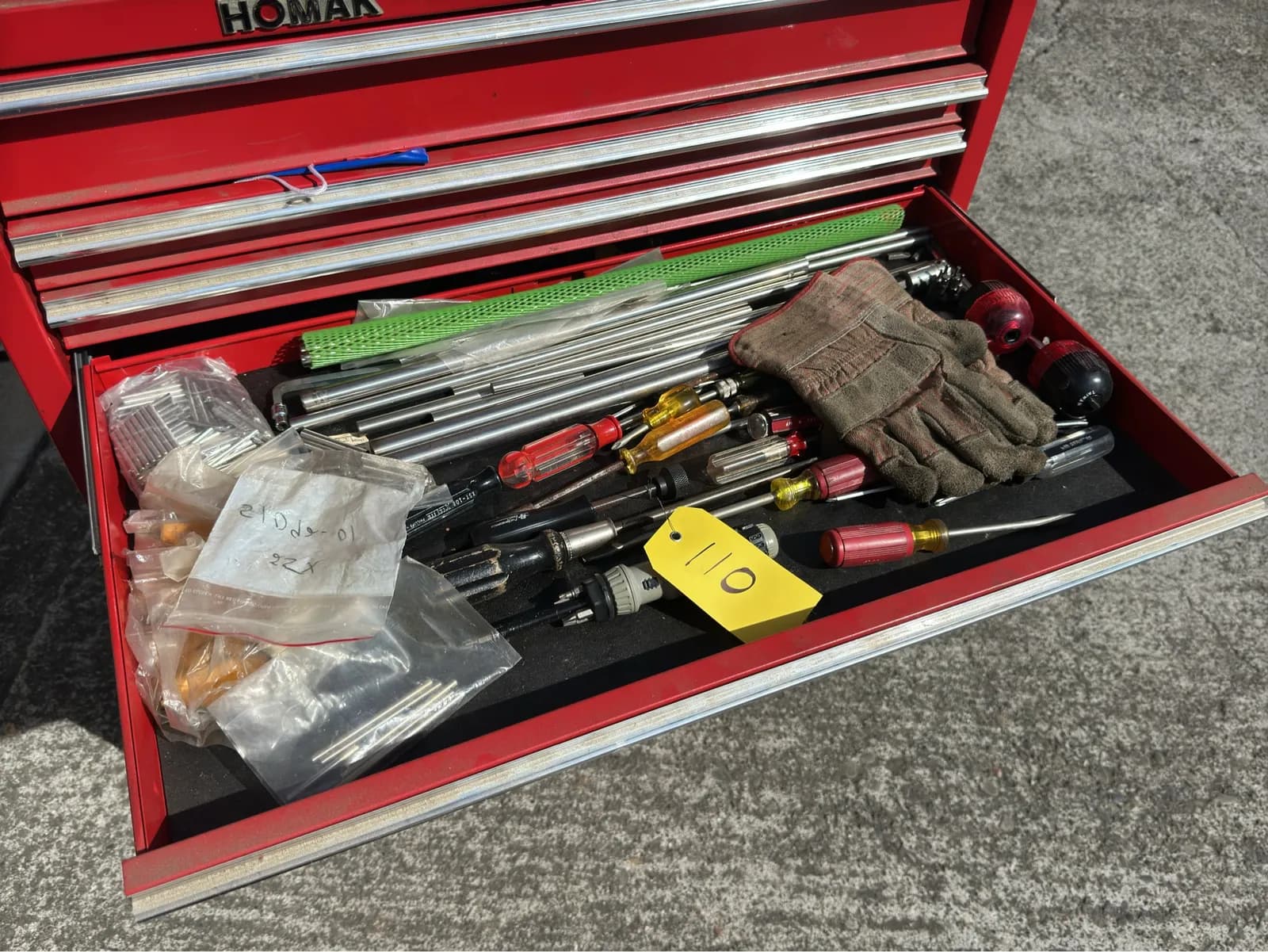 contents-of-drawer-assorted-screwdrivers-flat-heads-welding-gloves-and-more-bfa4bf