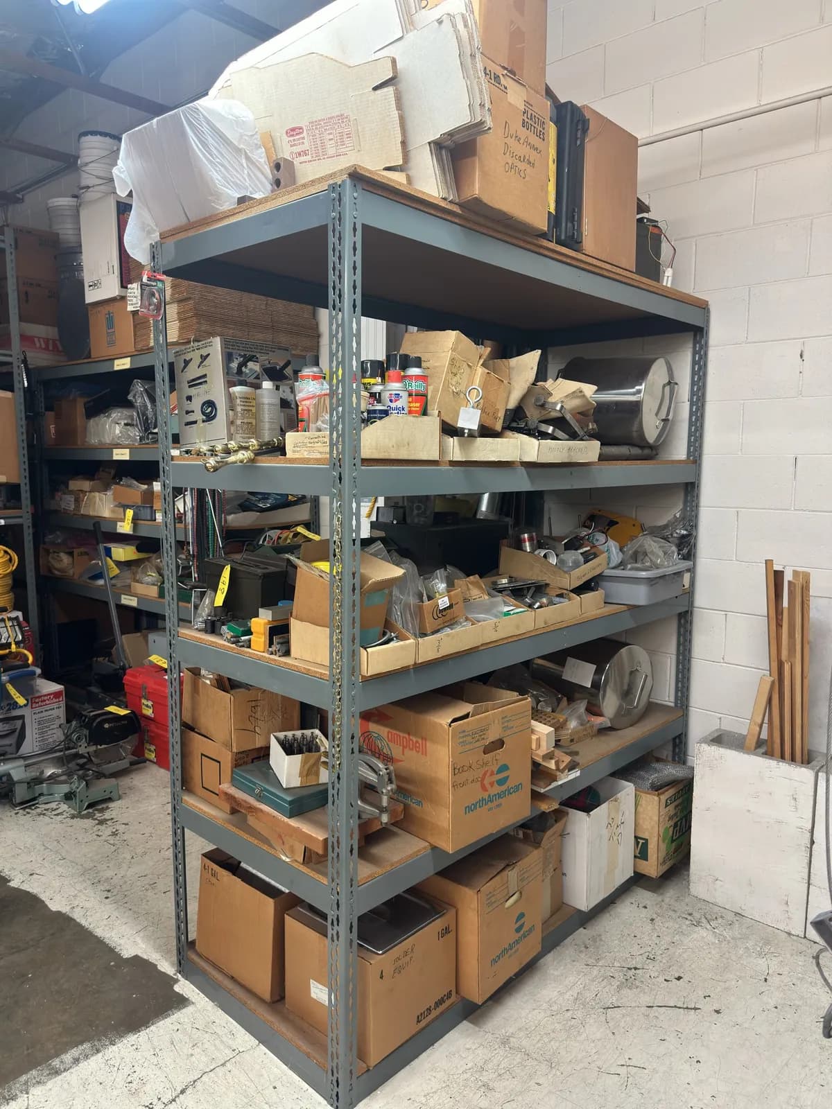 contents-of-rack-cardboard-boxes-assorted-hardware-assorted-lubricants-and-cleaners-and-more-9900e3