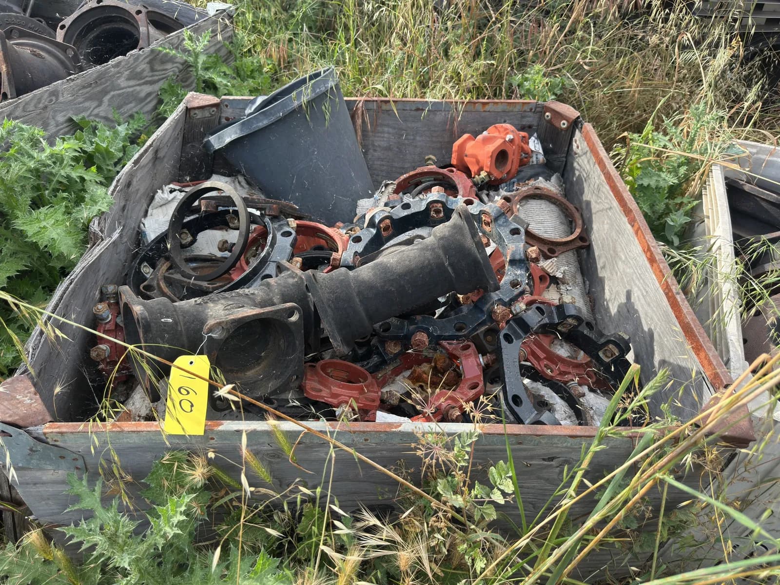 crate-of-assorted-industrial-pipe-fittings-and-more-mnp6zloo