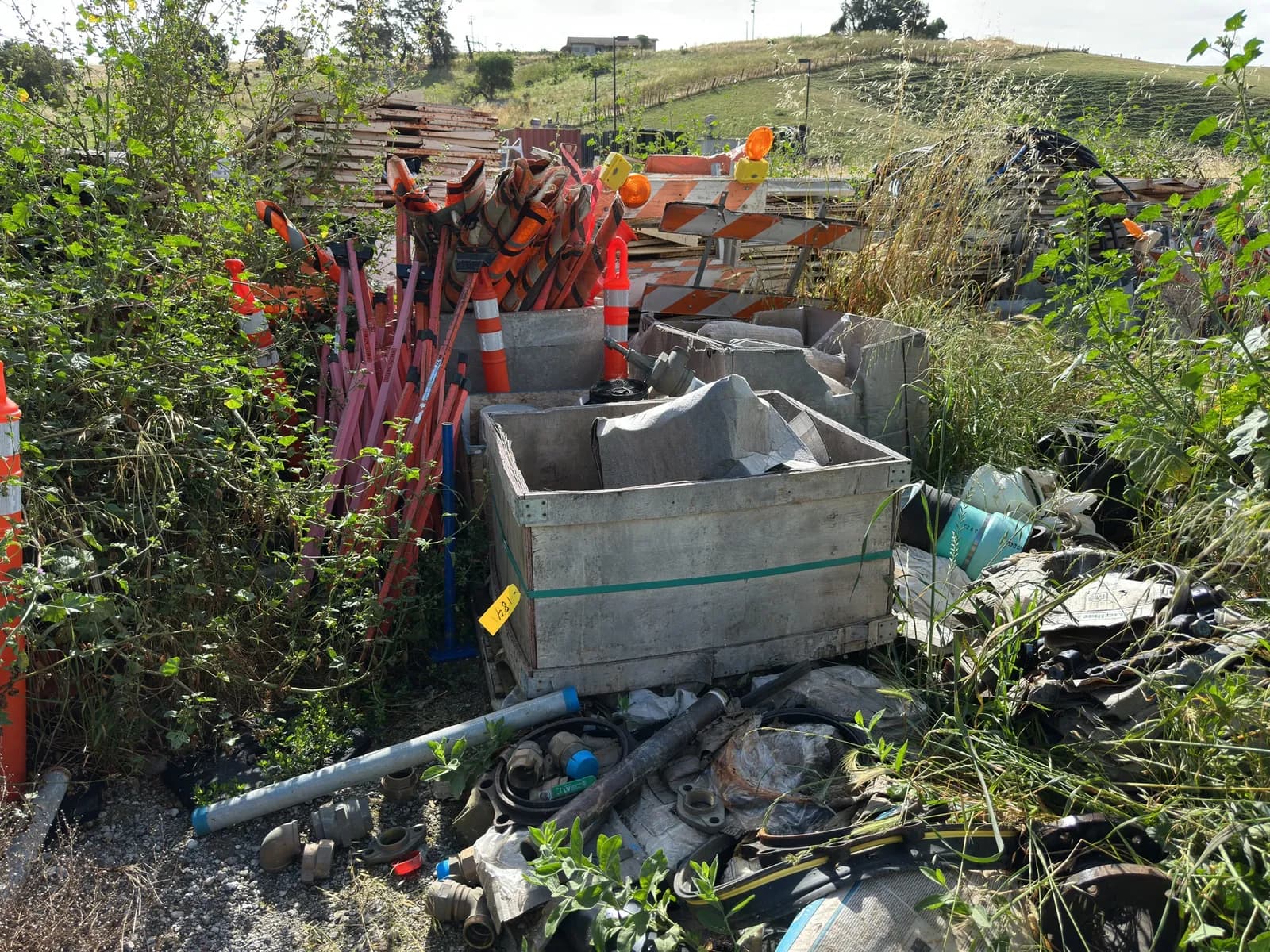 contents-of-section-assorted-pipe-fittings-construction-signs-crate-of-wire-and-more-4dddd1