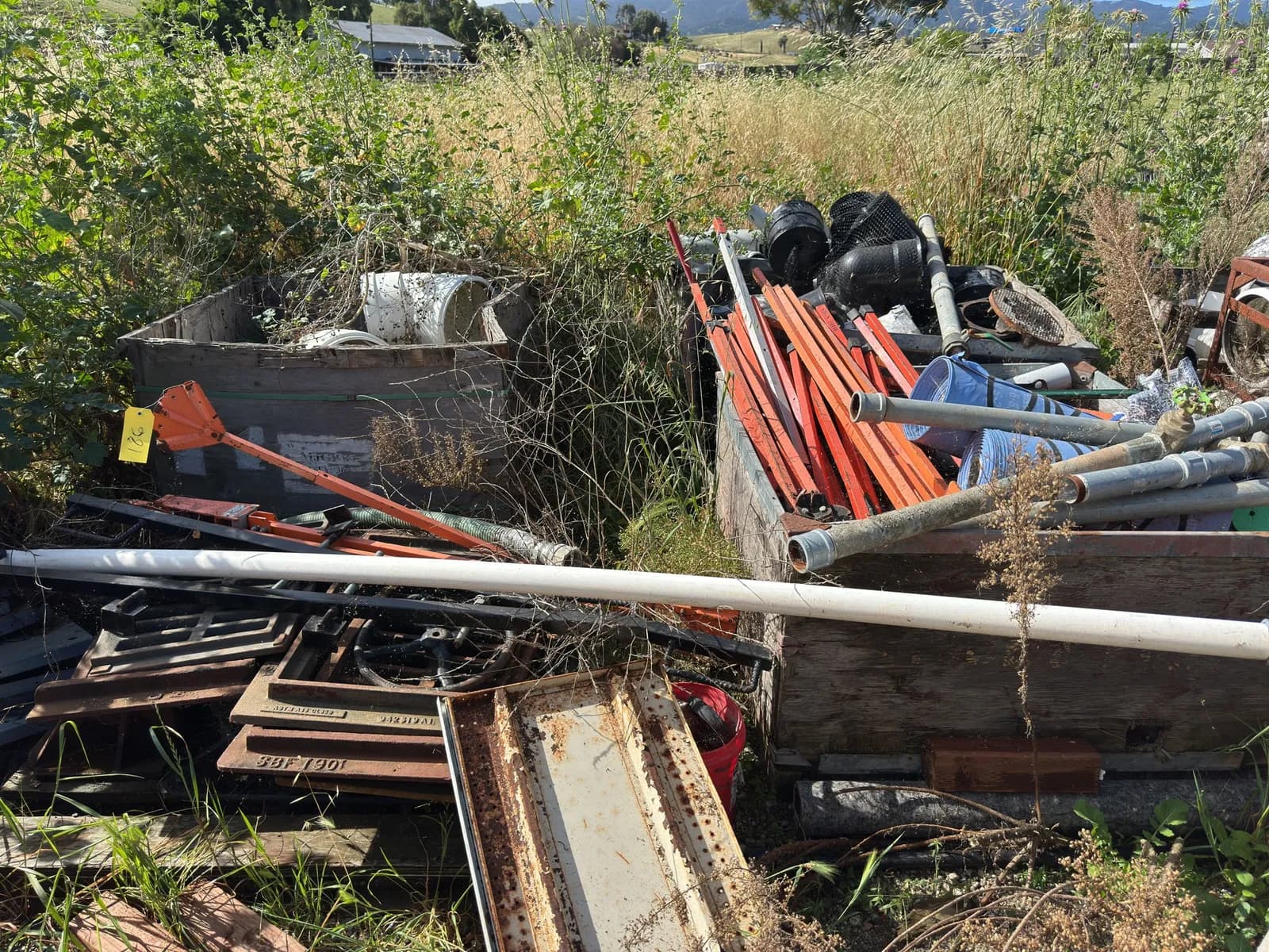 contents-of-section-sewer-grates-pvc-pipe-elbows-construction-sign-stands-and-more-09008b