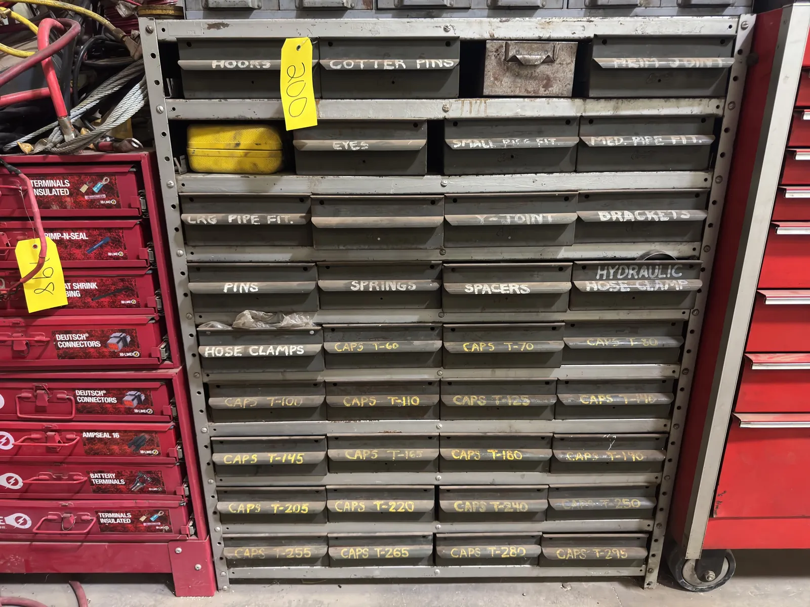 metal-hardware-organization-rack-with-contents-plastic-caps-hose-joint-fittings-and-more-68717e