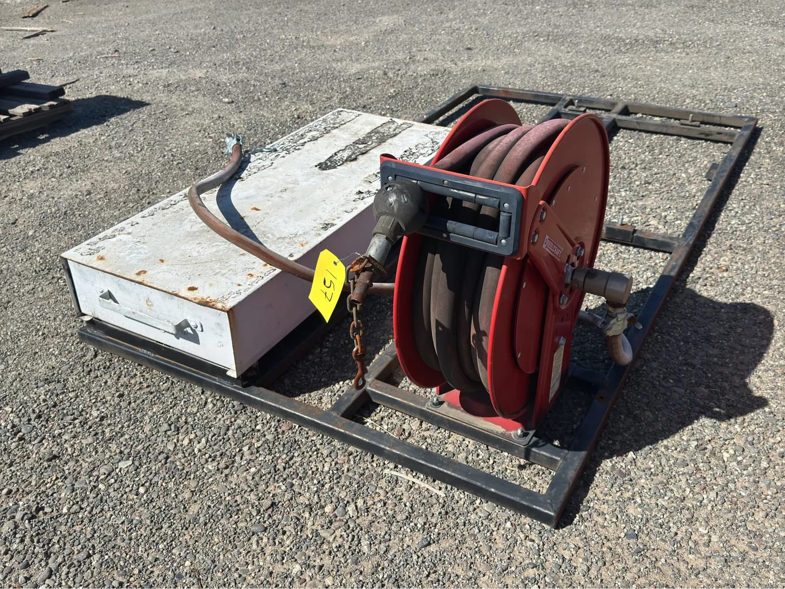 steel-frame-with-mounted-reelcraft-hose-reel-and-cargo-slide-box-5d6931