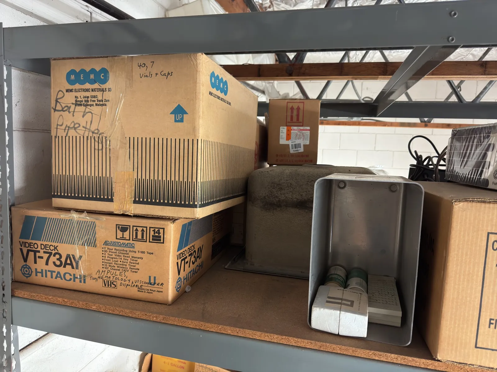 contents-of-shelf-assorted-laboratory-equipment-steel-sinks-and-more-6cc478
