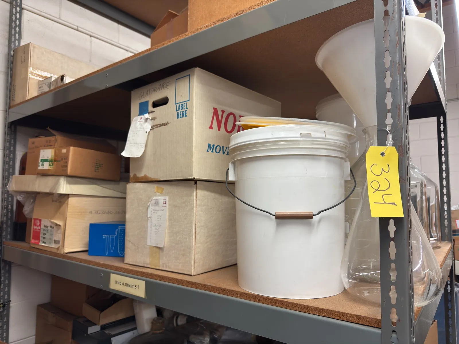 contents-of-shelf-assorted-laboratory-glassware-and-equipment-9df399
