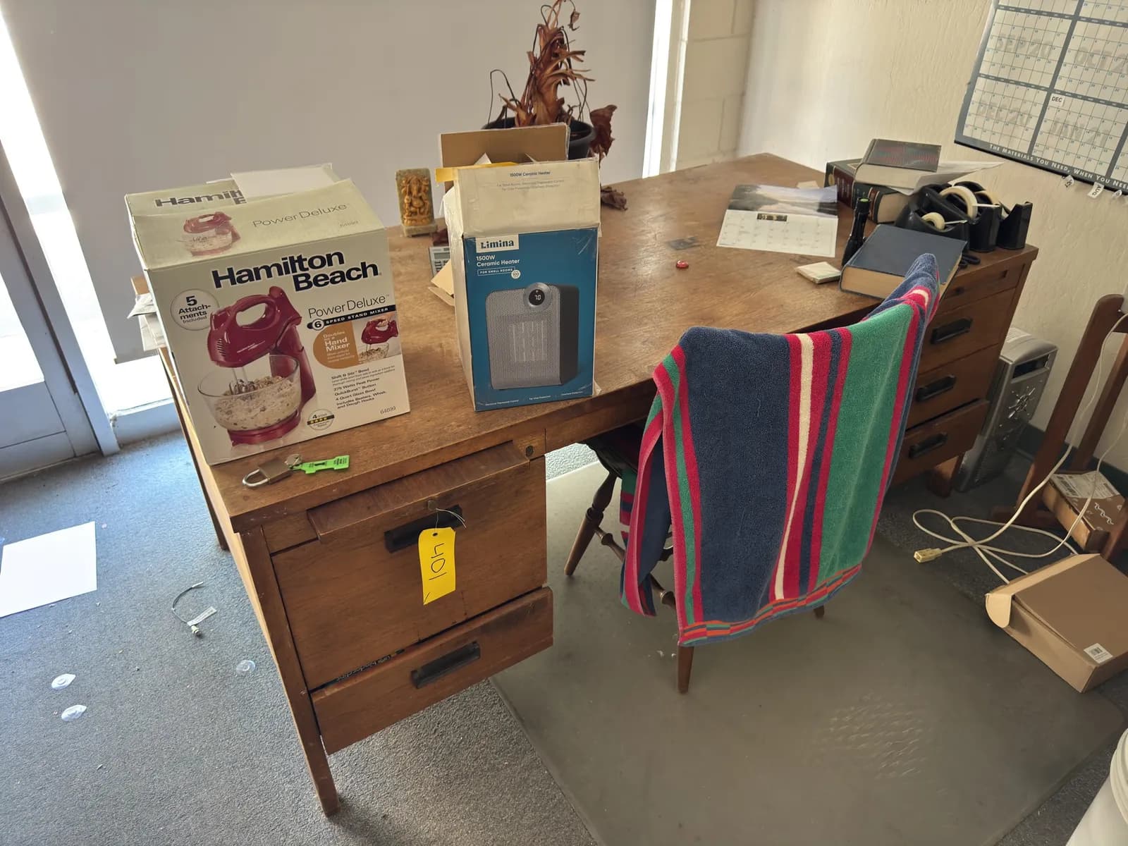 desk-and-contents-hand-mixer-heater-books-and-chair-de1e72