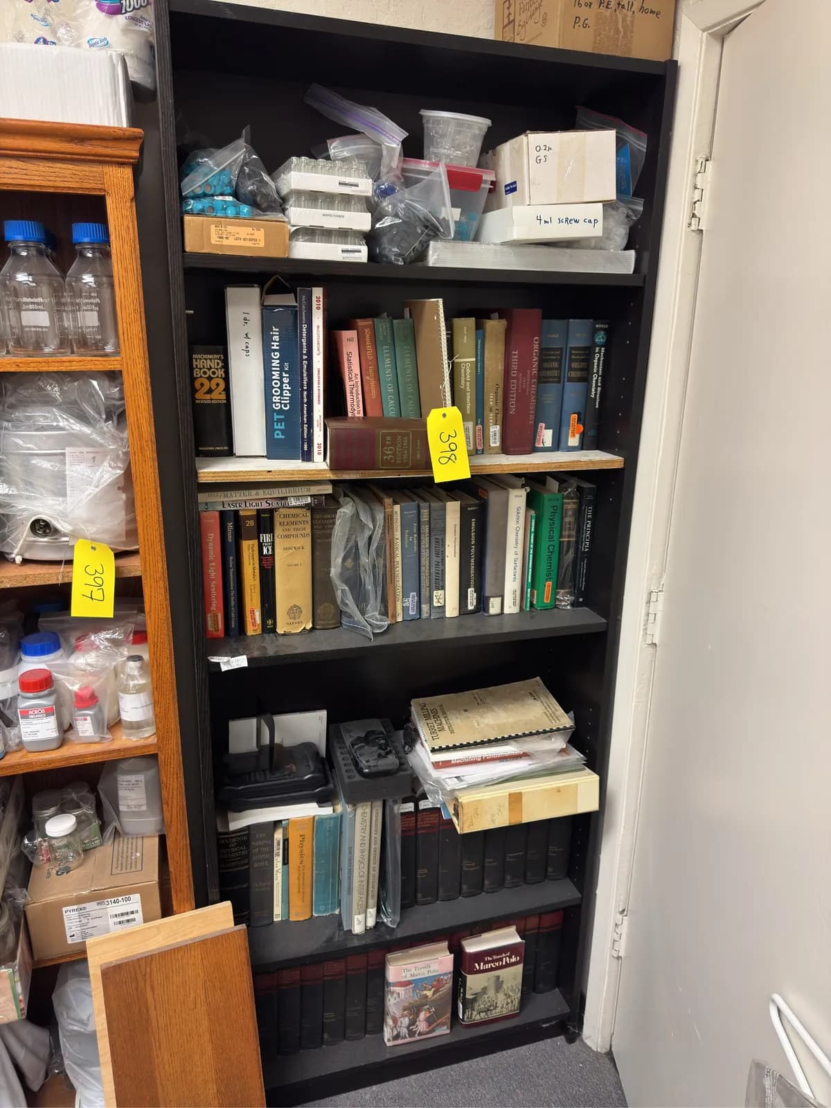 bookshelf-and-contents-books-plugs-and-vials-afa741
