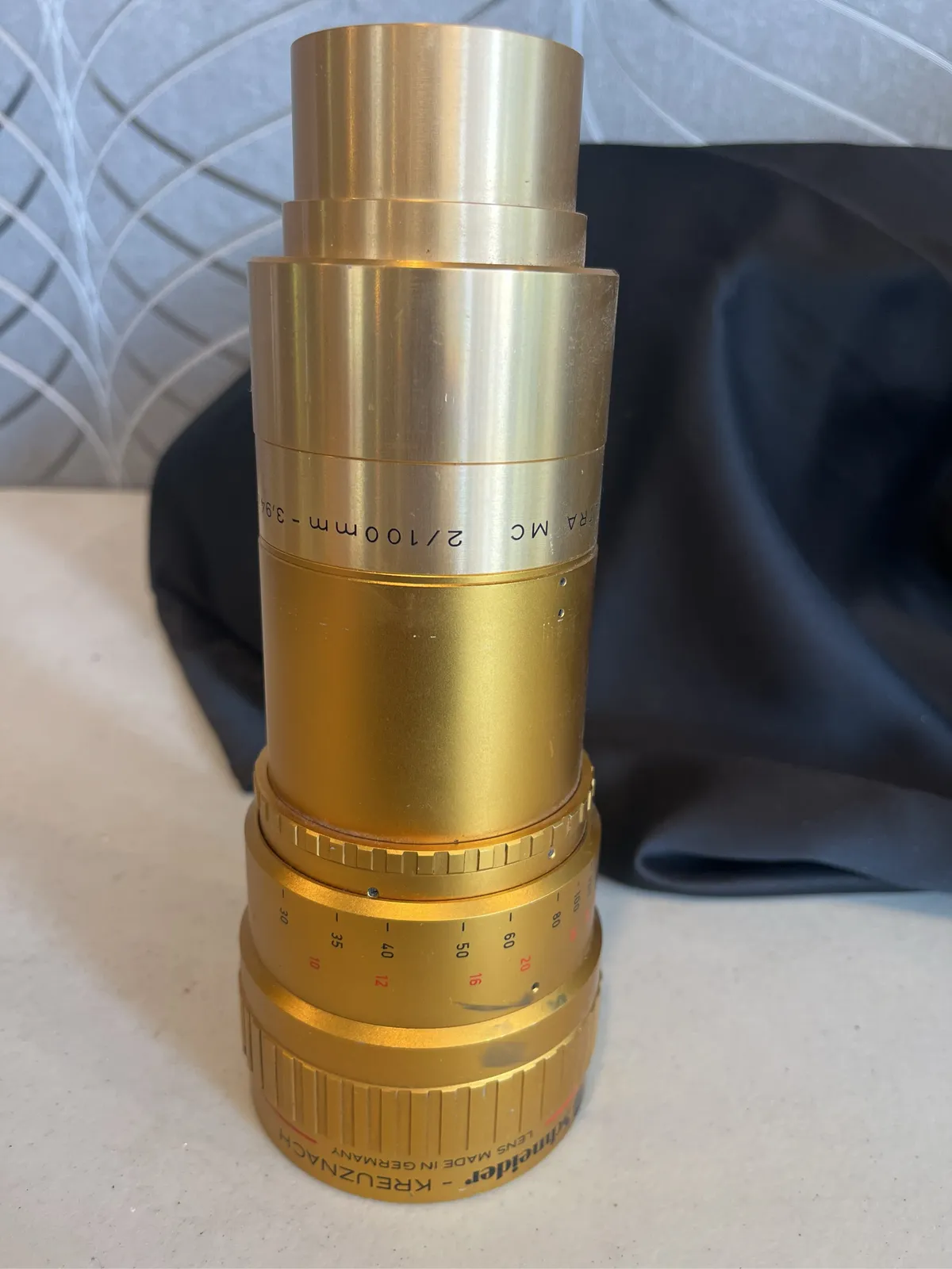kern-paillard-100mm-f-35-telephoto-lens-in-gold-finish-fda8ff