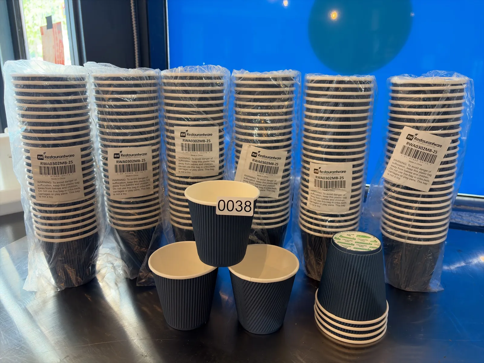 6-sleeves-of-25-blue-rippled-8oz-hot-cups-mpq45y2p