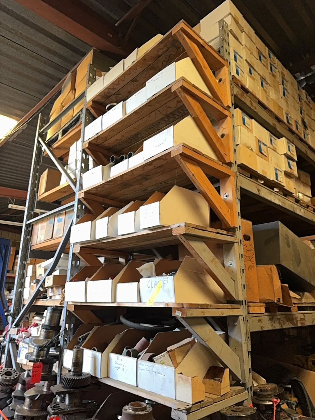 contents-of-wooden-shelves-hoses-and-hose-clamps-mqfo5ekq