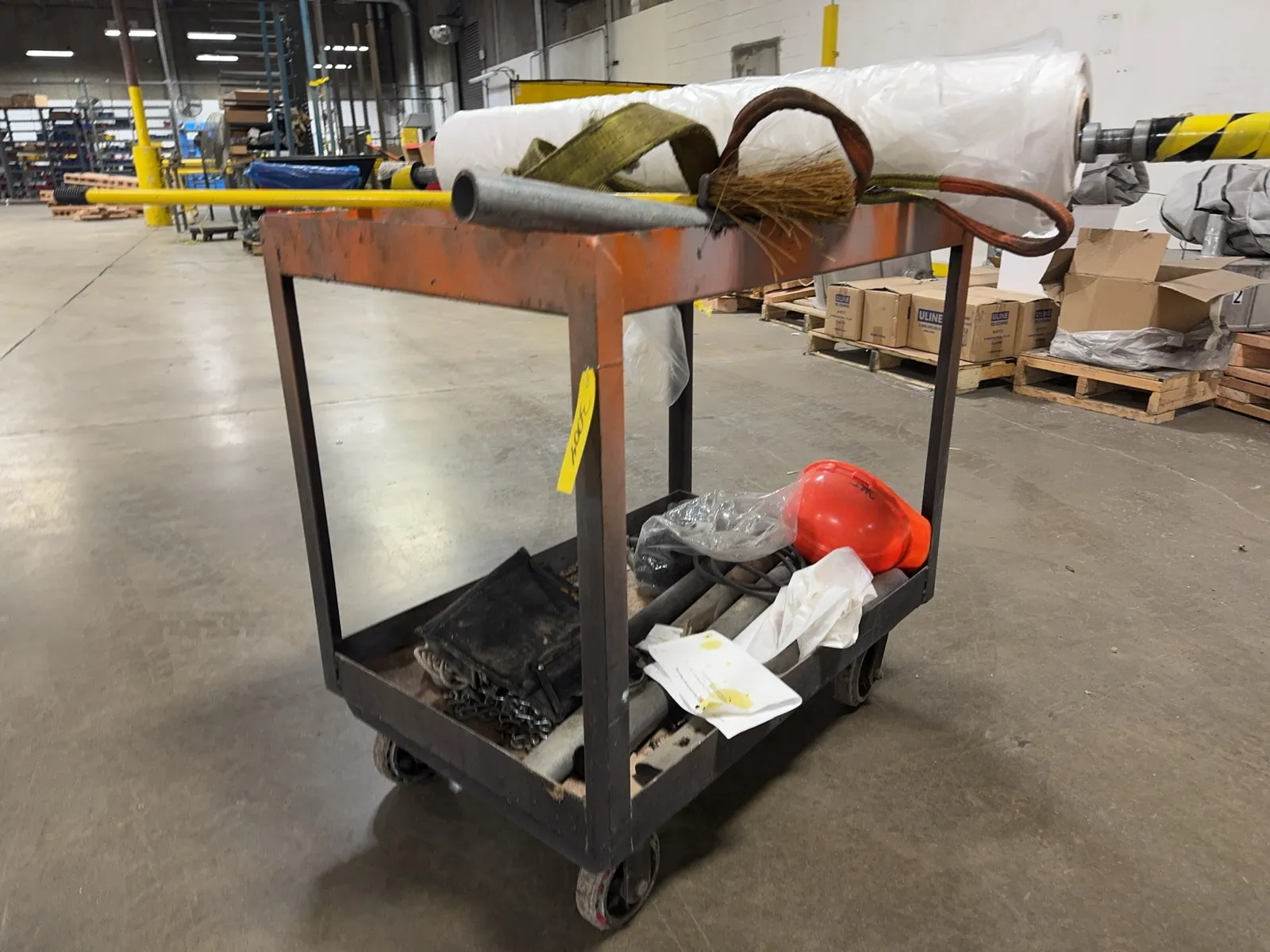 metal-rolling-cart-with-assorted-contents-mrcx3nso