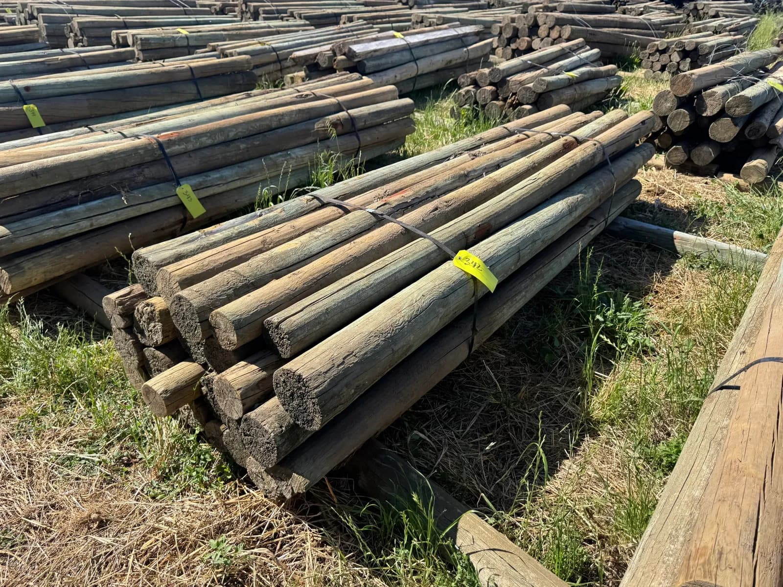 approximately-20-9-wood-posts-mro3ndlz