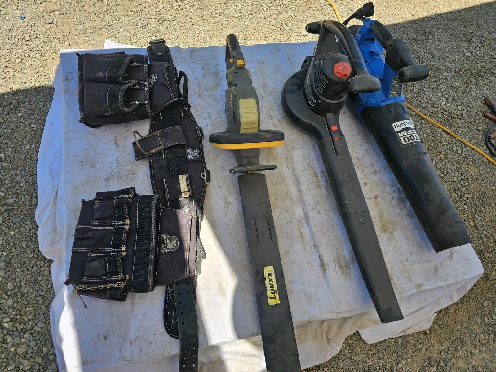 assorted-power-tools-and-tool-belt-mrxucdo4