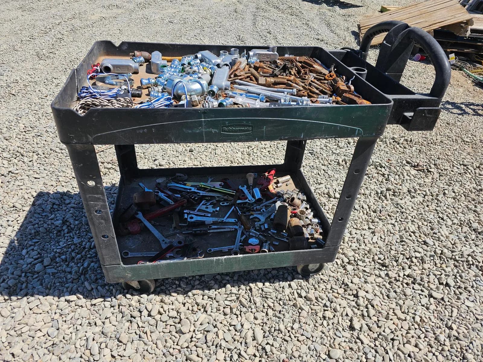 tool-cart-loaded-with-assorted-hand-tools-and-hardware-25987e