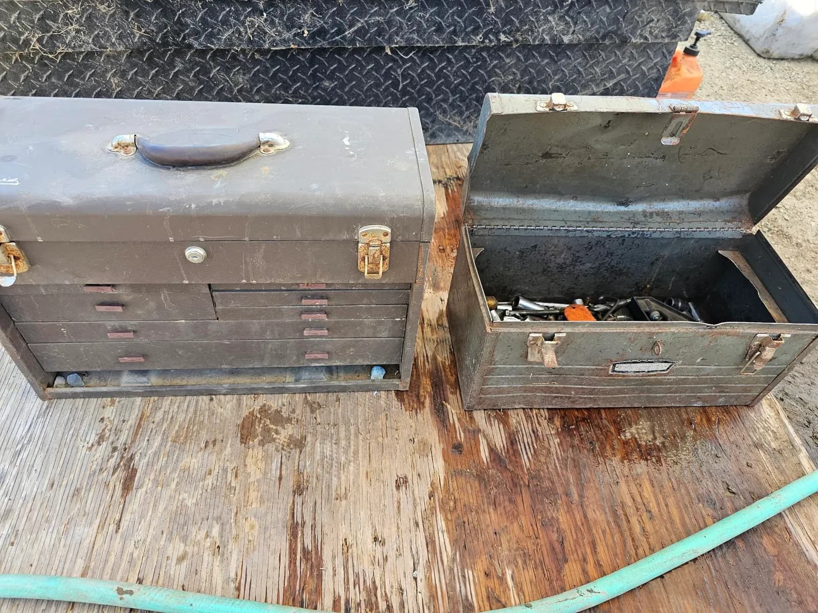vintage-metal-toolboxes-with-assorted-tools-inside-291556