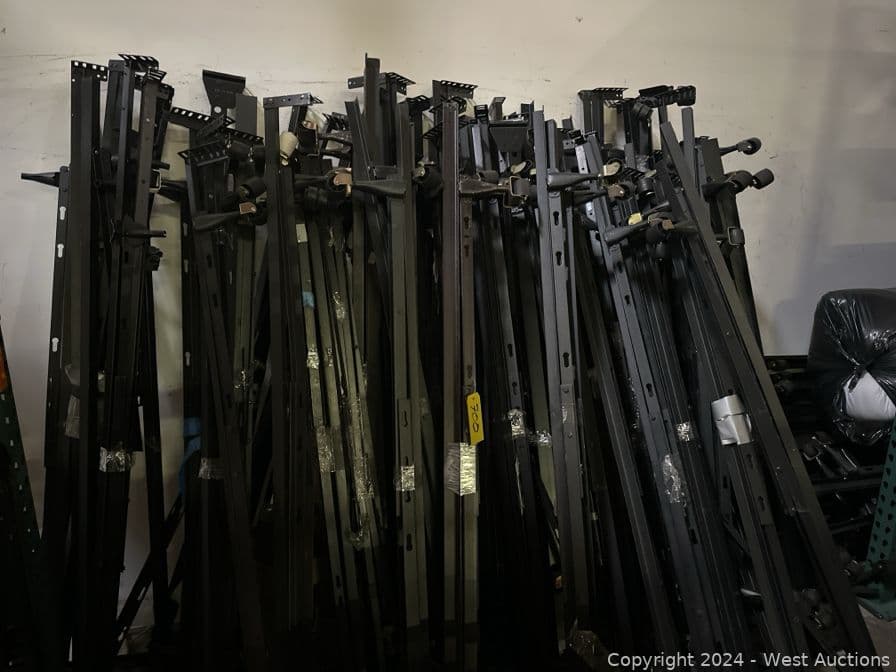 bulk-lot-of-metal-bed-frames-with-casters-560988