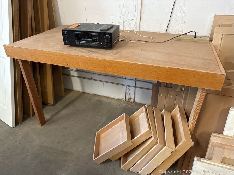 wooden-table-and-contents-onkyo-am-fm-receiver-581247