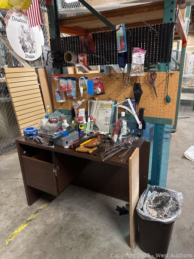 desk-with-contents-assorted-tools-hardware-and-more-584327