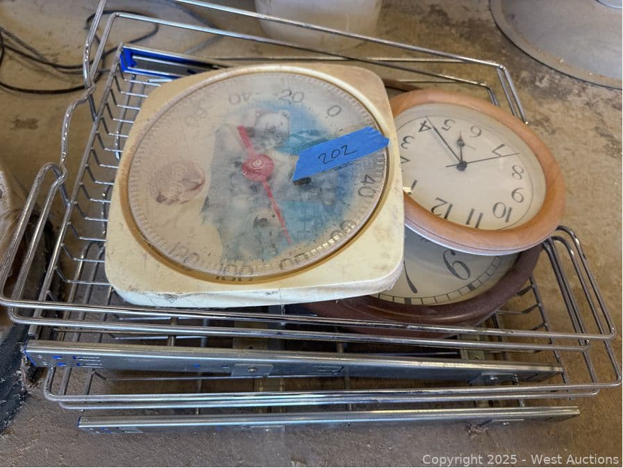 metal-shelving-and-3-clocks-590367