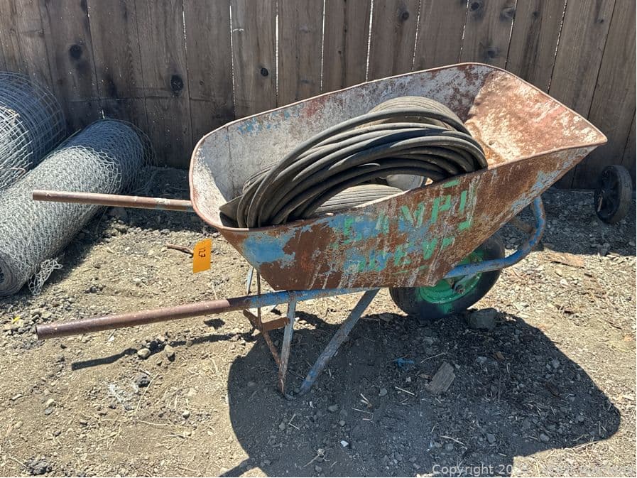 wheelbarrow-and-contents-spare-tires-3-8-air-hose-593456