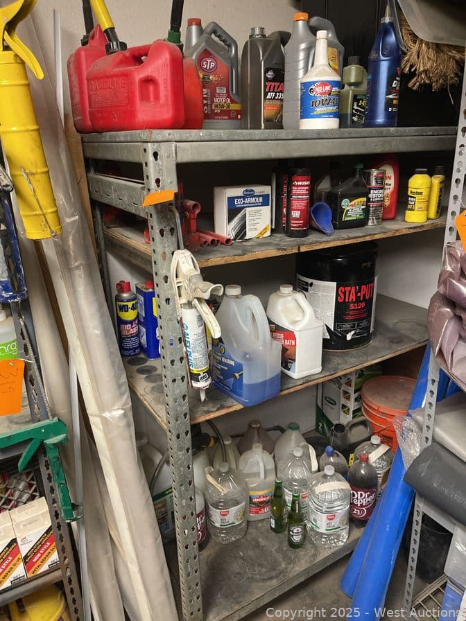 racking-with-assorted-contents-oils-gas-tanks-cleaner-and-more-594386