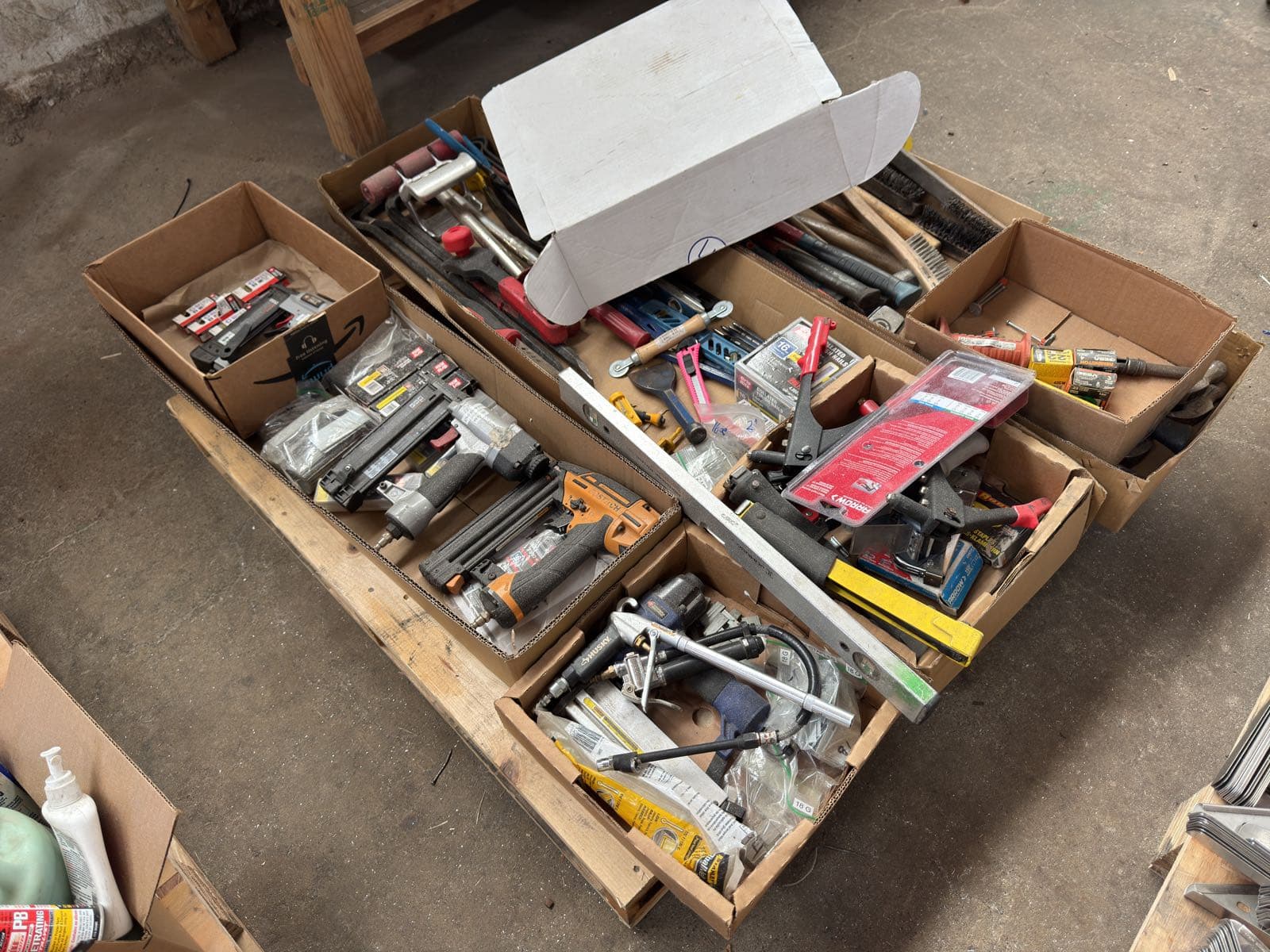 contents-of-pallet-staple-guns-mallets-wire-brushes-and-rivet-guns-ml1efin4