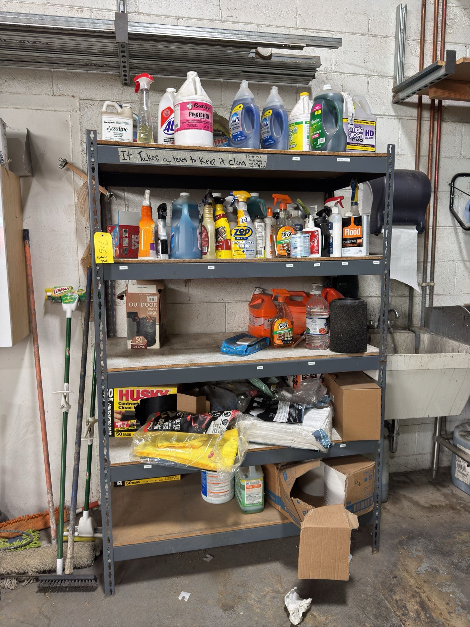 rack-and-contents-bulk-cleaning-supply-trash-bags-rags-soap-and-assorted-cleaning-agents-ml1egelb