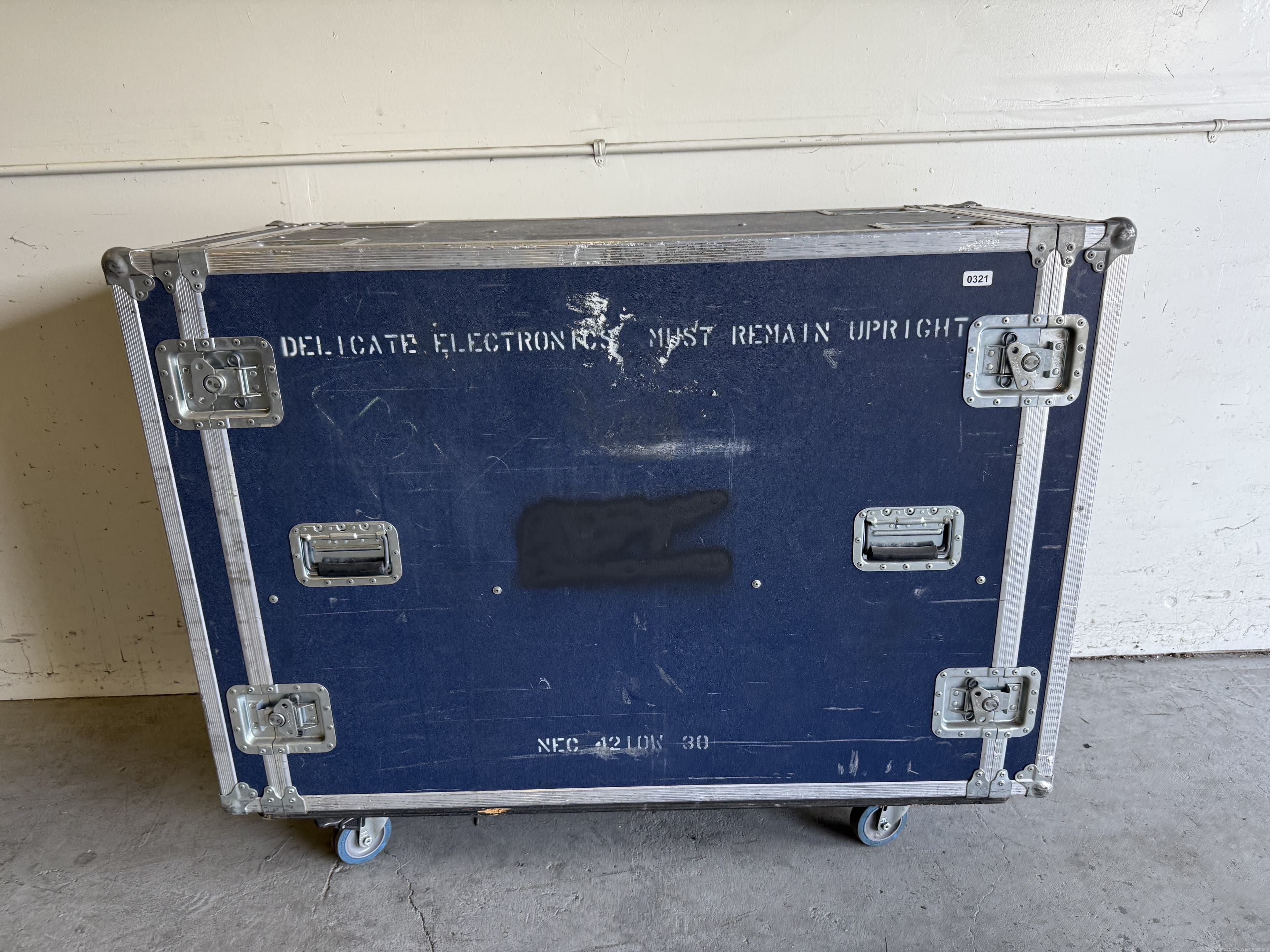 nec-42-plasma-tv-in-road-case-617328