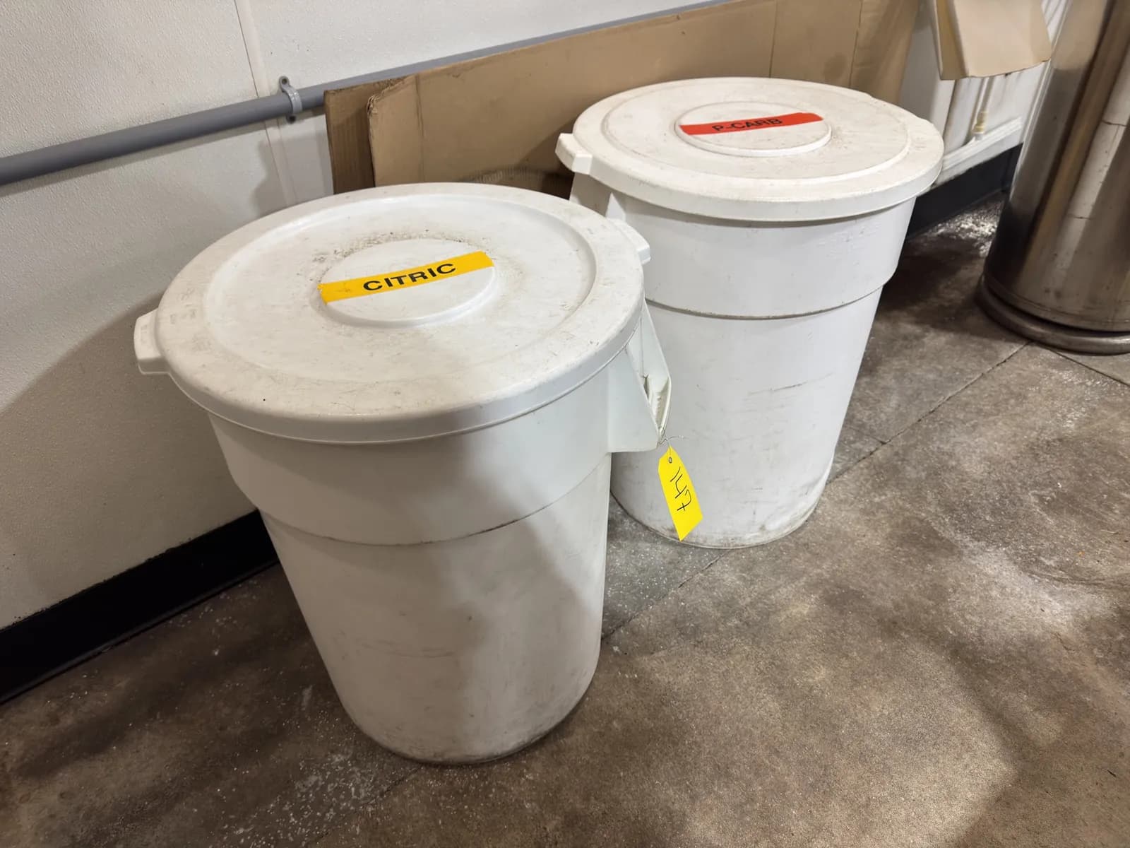 2-50-gallon-trash-cans-with-2-bags-of-citric-acid-and-p-carb-b0f600