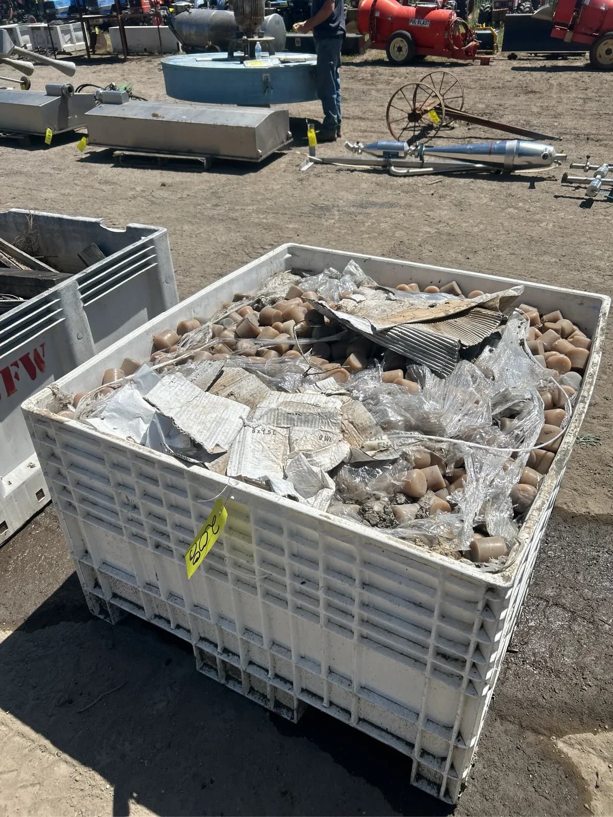 1-2-ton-bin-filled-with-rubber-bungs-2290f3