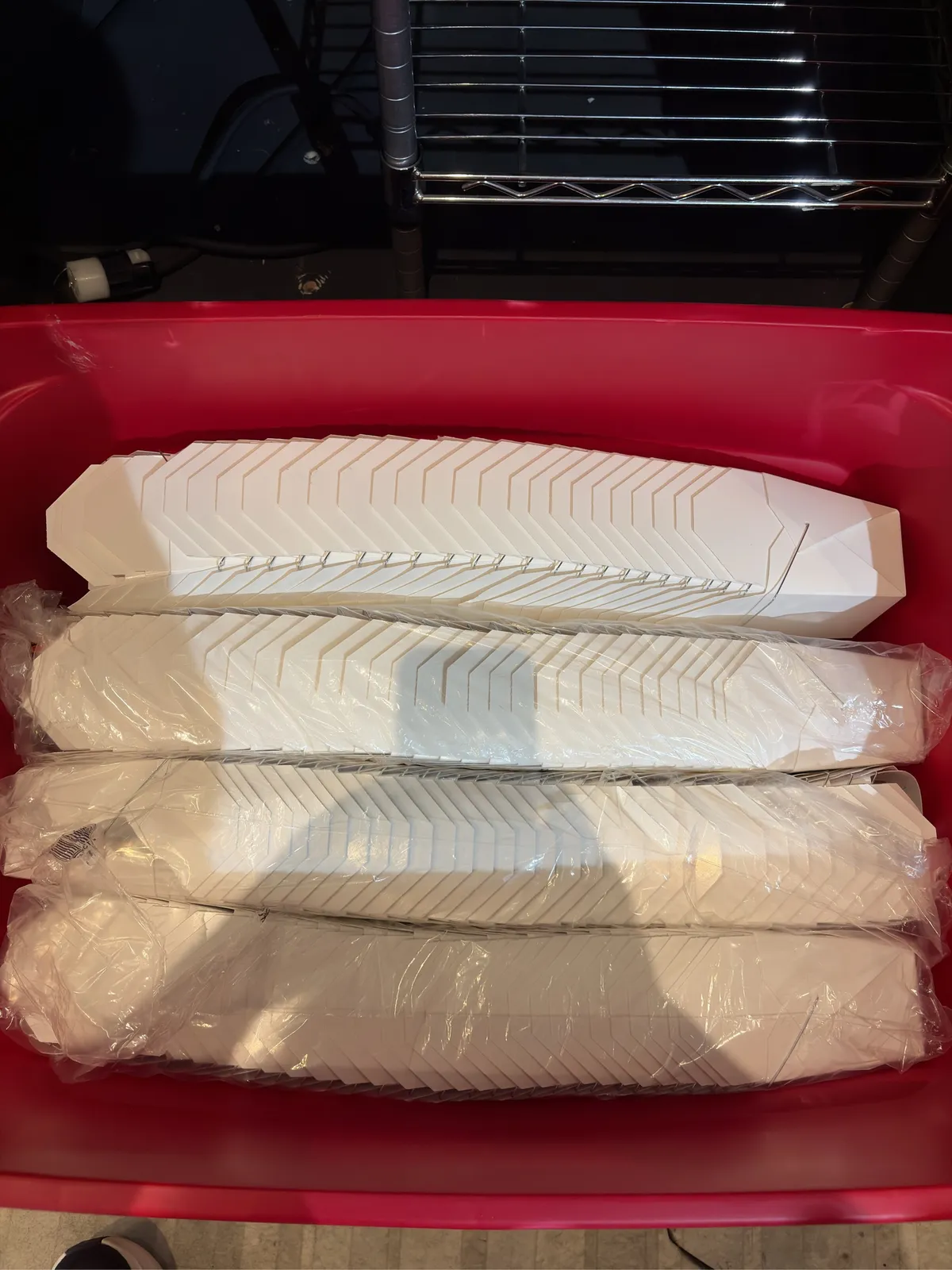 bin-of-sleeves-of-white-chinese-food-boxes-with-silver-handle-mpq3shk5