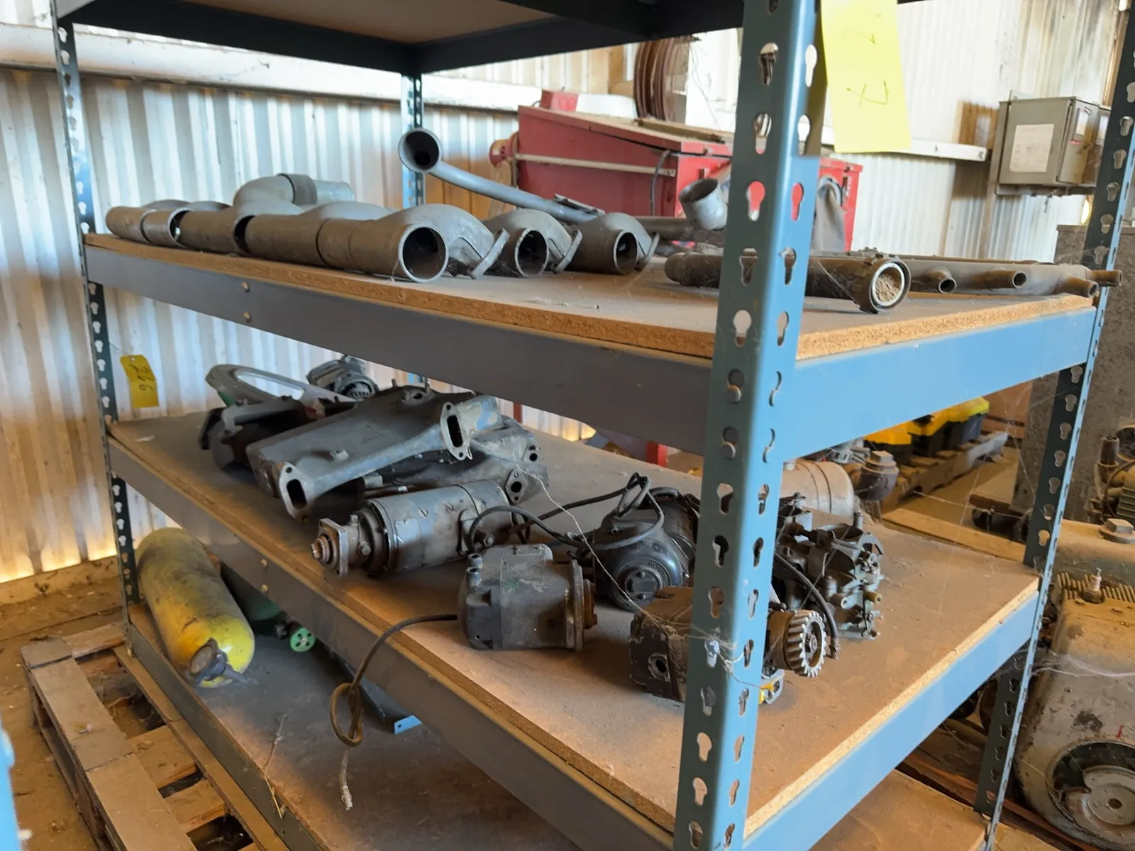 contents-of-rack-assorted-aviation-engine-parts-carburetor-and-more-ms9d0kpq