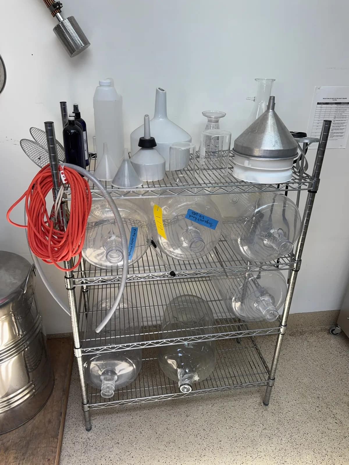 stainless-steel-uline-rack-and-contents-plastic-6-gallon-jugs-glassware-mashers-and-funnels-ms998l3a